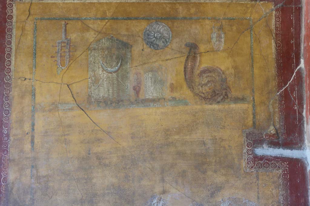 VI.16.7 Pompeii. December 2018.
Room F, painting of objects of the cult of Isis, on east wall of lararium. Photo courtesy of Aude Durand.