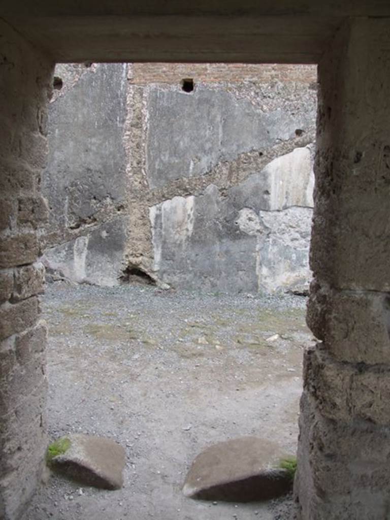 VII.1.8 Pompeii. December 2007. Room 8, women’s baths anteroom. Doorway from gymnasium C, leading to women’s baths and praefurnium 7.