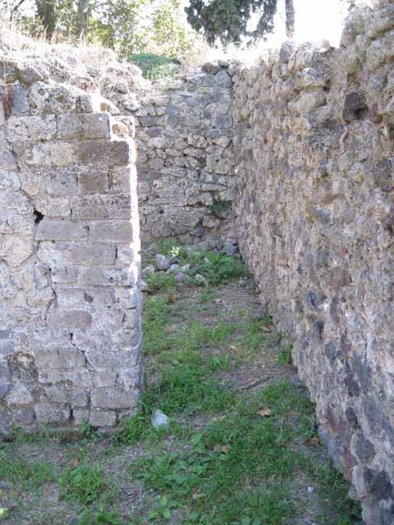 I.1.3 Pompeii. September 2010.
Doorway in south-west corner to room “i” near south wall. Photo courtesy of Drew Baker.
