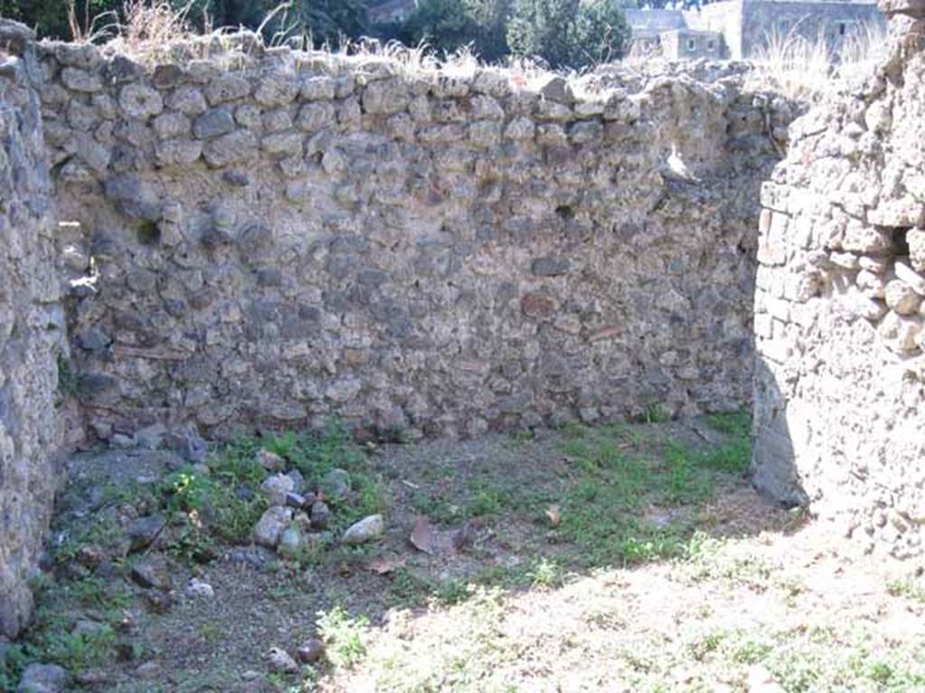 I.1.3 Pompeii. September 2010.
Looking towards west wall of room “h”, with doorway in north-west corner, on right. Photo courtesy of Drew Baker.