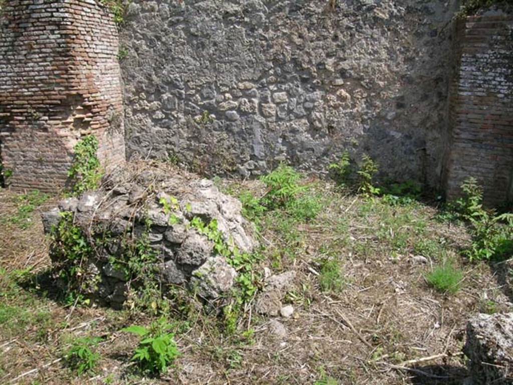 I.1.4 Pompeii. June 2005. Looking towards south wall of shop-room. Photo courtesy of Nicolas Monteix.