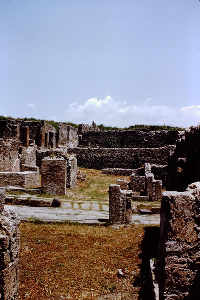 I.1.8 Pompeii. 1966.
Looking across the Via Stabiana, from rear of VIII.7.8, towards the ramp of the entrance doorway.
Photo by Stanley A. Jashemski.
Source: The Wilhelmina and Stanley A. Jashemski archive in the University of Maryland Library, Special Collections (See collection page) and made available under the Creative Commons Attribution-Non-Commercial License v.4. See Licence and use details.
J66f0200