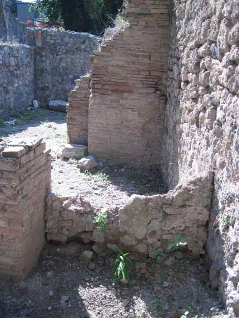 I.1.10 Pompeii. September 2010. Looking west from room in north-east corner, across entrance room. Photo courtesy of Drew Baker.