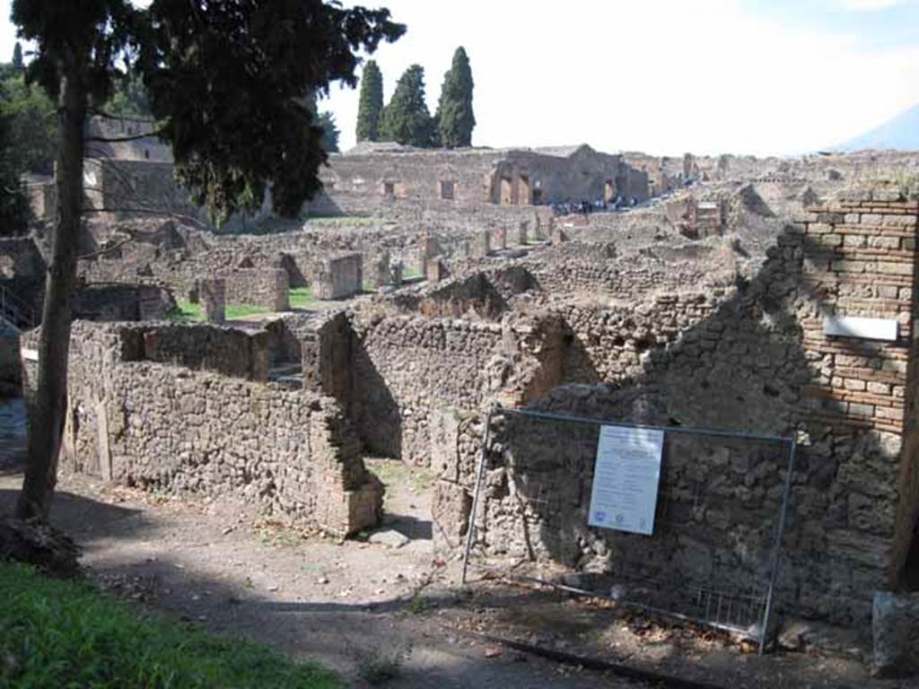 1.1.10 Pompeii. September 2010. View from wall showing side of I.1 looking north towards odeon Photo courtesy of Drew Baker.