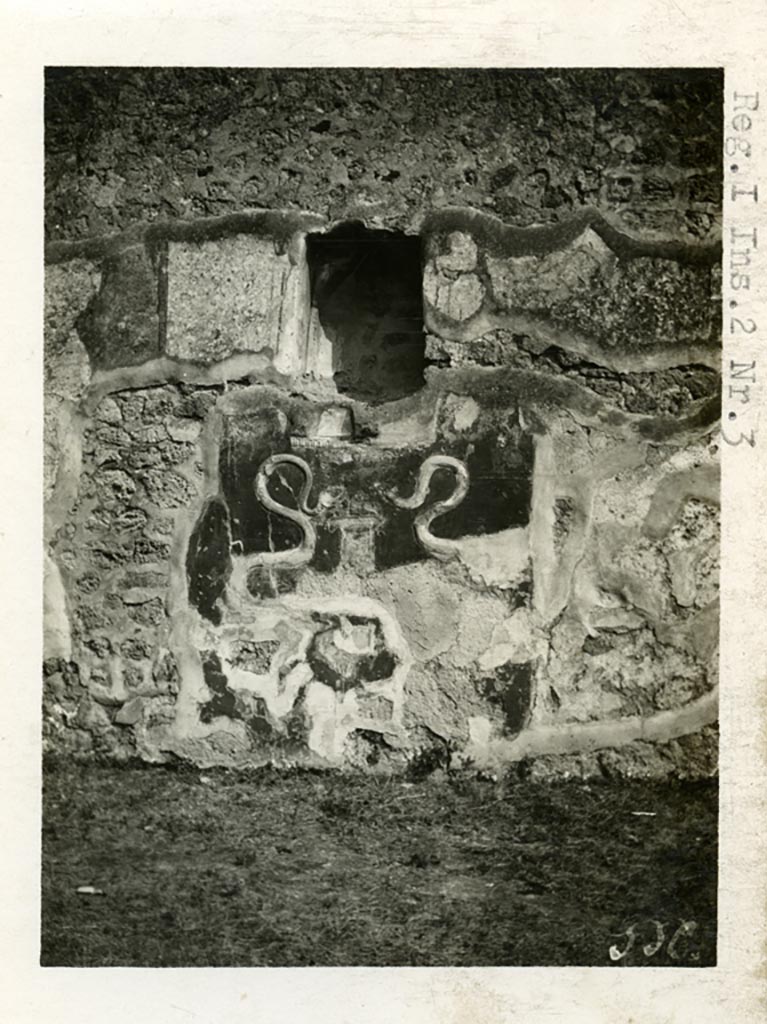 I.2.3 Pompeii. Pre-1937-39.
Photo in AAR archive dated pre-1937-39. Looking towards south wall of atrium, with lararium.
It seems to be the same as the one dated by Warscher as 1912 in the DAIR copy of the codex.
Photo courtesy of American Academy in Rome, Photographic Archive. Warsher collection no. 556.