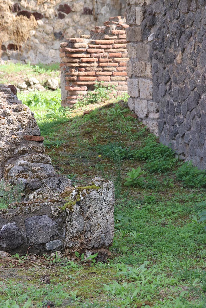 I.2.3 Pompeii. October 2024.
Looking east along corridor leading to garden and rear rooms. Photo courtesy of Klaus Heese.