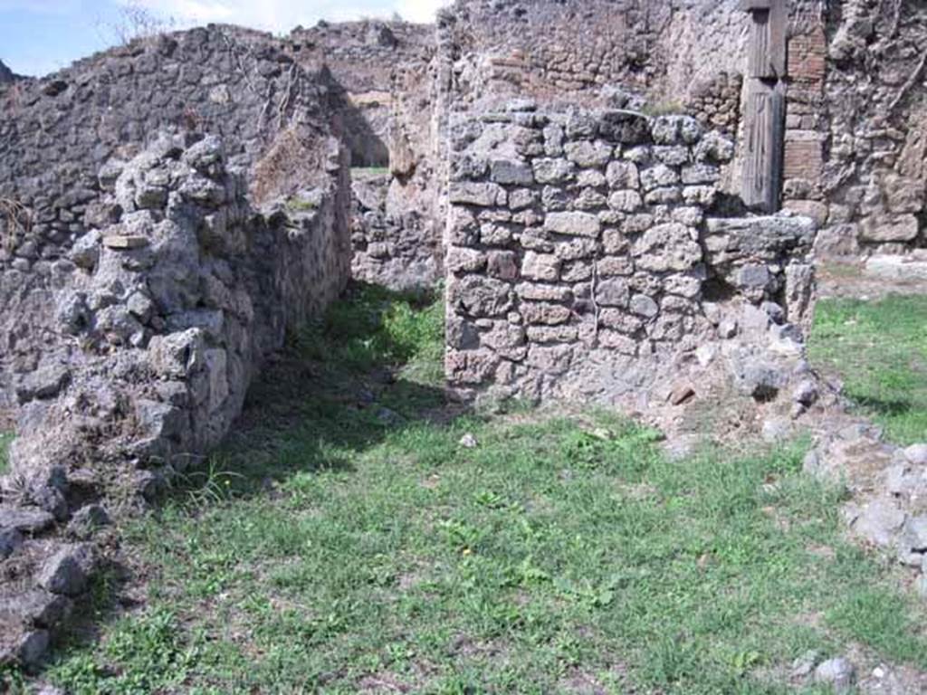 1.2.3 Pompeii. September 2010. Looking north across remains of kitchen, towards north wall and stairs. Photo courtesy of Drew Baker