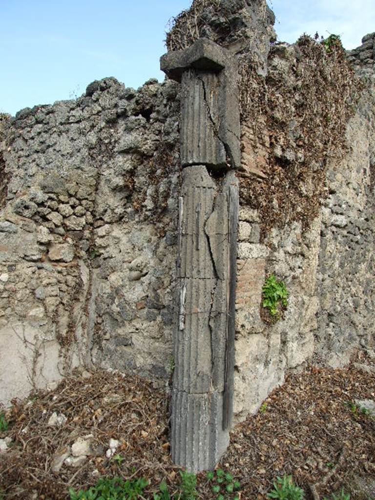 I.2.3 Pompeii. December 2006. Etruscan Column. According to Jashemski, the small vestibule on the north side of the garden (excavated 1873) was decorated with remnants of tufa columns brought from another site. See Jashemski, W. F., 1993. The Gardens of Pompeii, Volume II: Appendices. New York: Caratzas. (p.21)