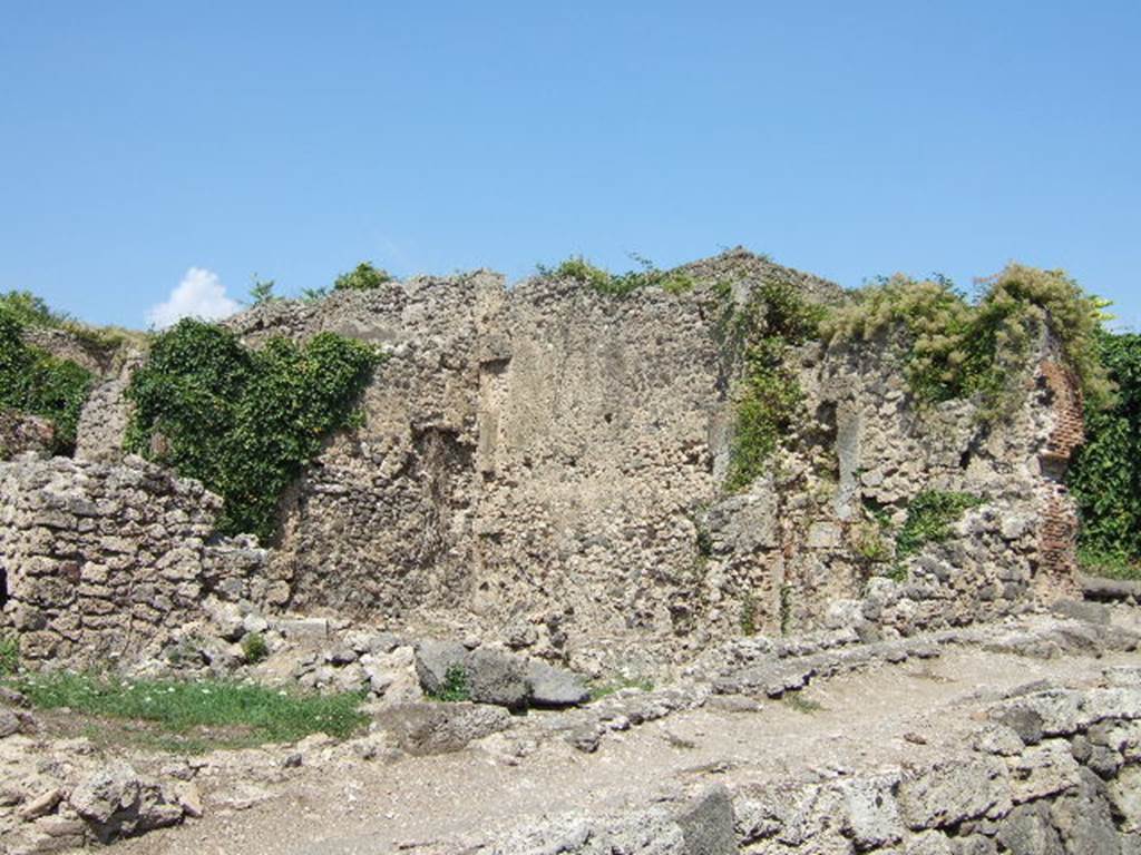I.2.3 Pompeii. September 2005. Two rooms in the south east corner at the rear of the house. Taken from side road, Vicolo del Conciapelle