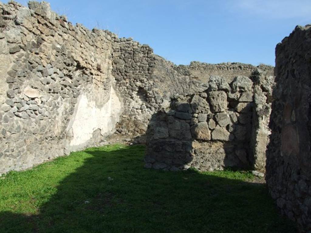 I.2.7 Pompeii. December 2007. Looking east to rear room. On the north wall of the rear room would have been a wooden staircase to the upper floor.
