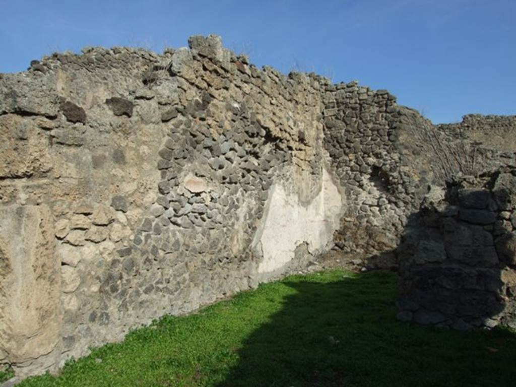 I.2.7 Pompeii. December 2007. North wall of shop and rear-room, against which would have been a wooden staircase in the rear room.