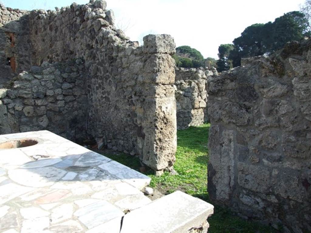 I.2.8 Pompeii. December 2007. South wall with doorway linking to I.2.7..
.