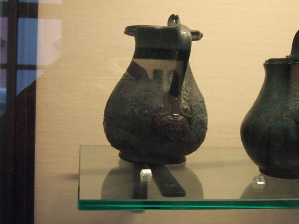 I.2.10 Pompeii. Found in atrium. Bronze jug. Now in Naples Archaeological Museum. Inventory number: 109817.