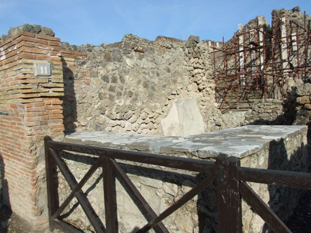 I.2.11 Pompeii. December 2007. Entrance, and north wall of bar.