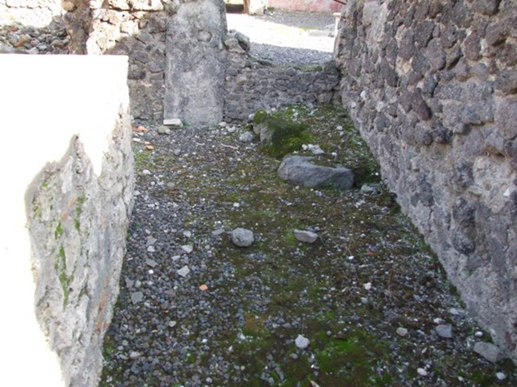 I.2.11 Pompeii. December 2007. South wall with base (for wooden staircase?) in south east corner.