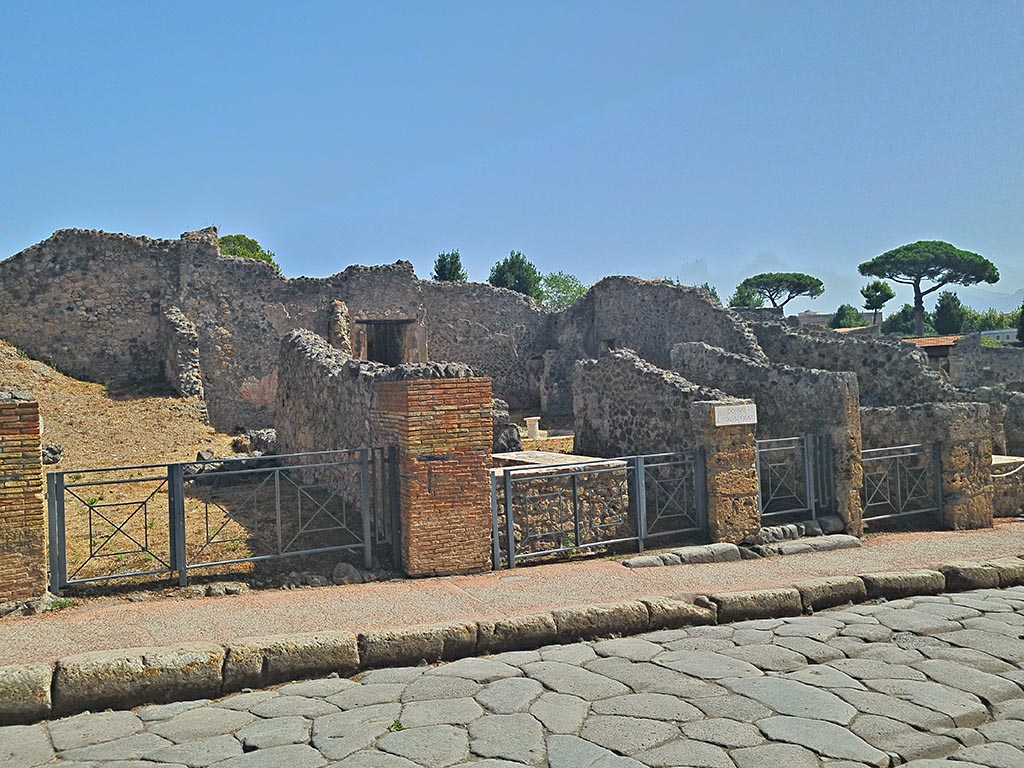 I.2.12 Pompeii, on right. September 2024.
East side of Via Stabiana, with entrance doorways from I.2.12, I.2.11, I.2.10 and I.2.9. Photo courtesy of Giuseppe Ciaramella.