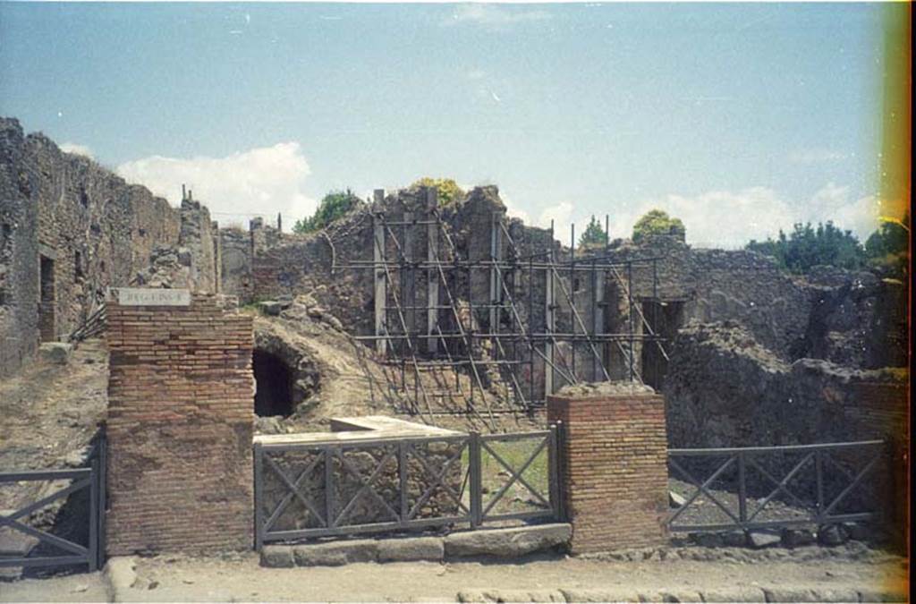 I.2.13 Pompeii. July 2011. Looking towards entrance doorway from Via Stabiana. Photo courtesy of Rick Bauer.
Warscher described this, quoting Fiorelli, as
“I.2.12/13 – due taberne aventi comunicazione tra loro. Il podio è rivestito di marmi.
Qui l’insula è delimitata dalla via secunda, sulla quale si aprono gl’ingressi di altre abitazioni”.
See Warscher T., 1935. Codex Topographicus Pompeianus: Regio I.2. Rome: DAIR.
(translation: "I. 2.12/13 - two workshops having communication between them. The podium was covered with marble. Here the insula is bounded by via secunda, on which opens the entrances of other dwellings.")