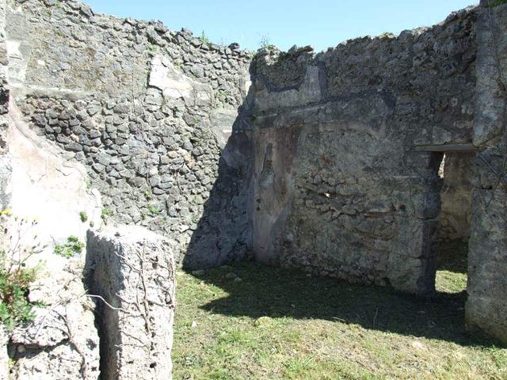 I.2.16 Pompeii. March 2009. Room 4, oecus, looking south-east through small doorway from room 3.