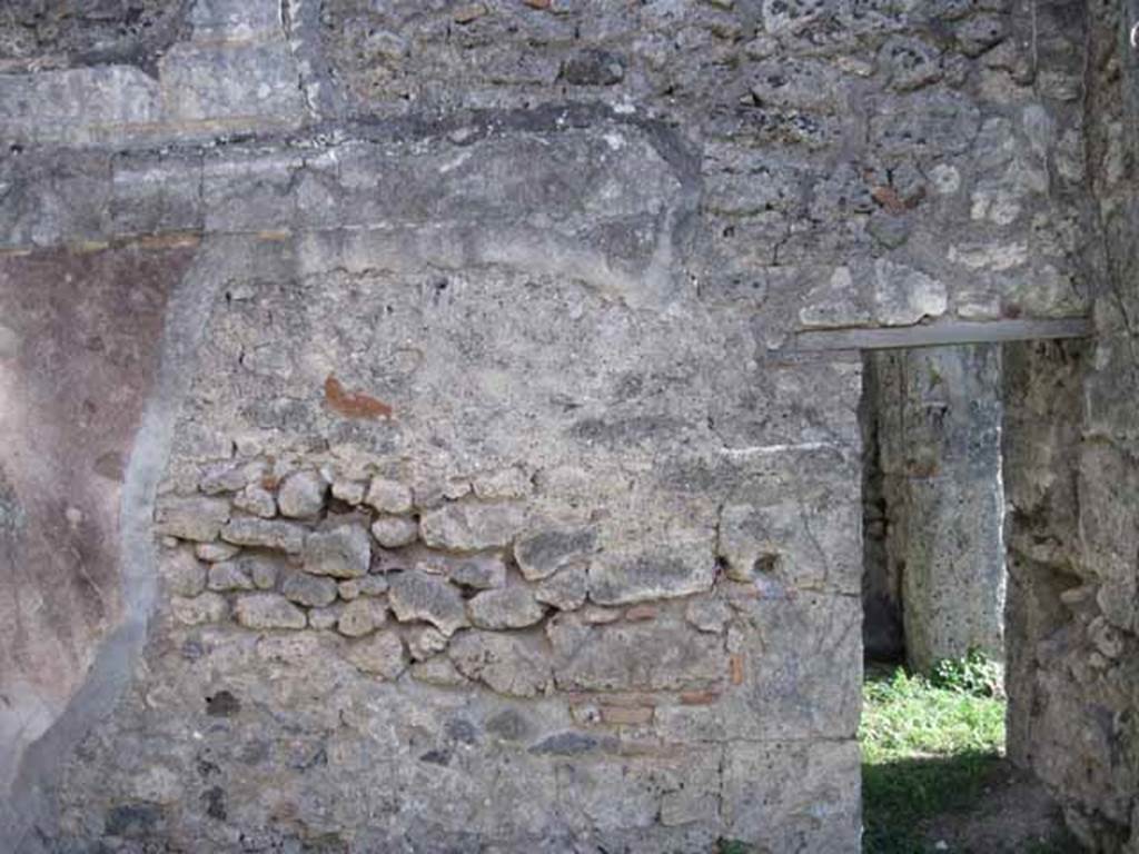 1.2.16 Pompeii. September 2010. Room 4, south wall with doorway into side wall of room 5. Photo courtesy of Drew Baker.