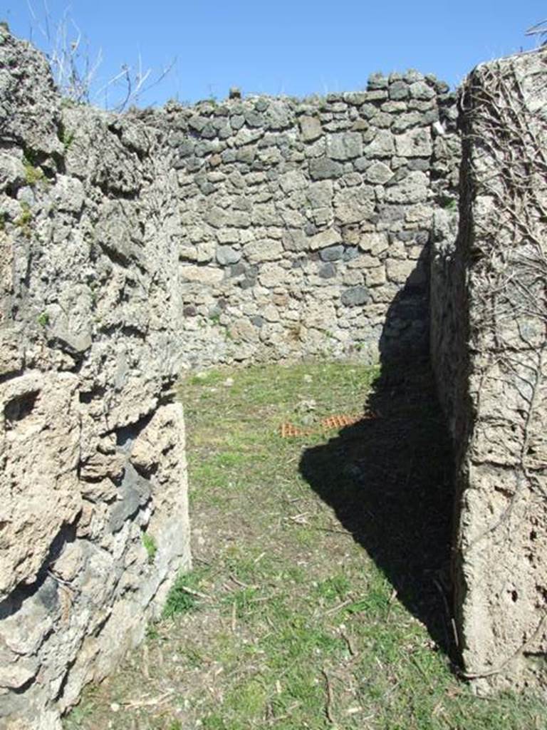 I.2.16 Pompeii. March 2009. Doorway to Room 2. Kitchen? with Well and Stairs to upper floor.
