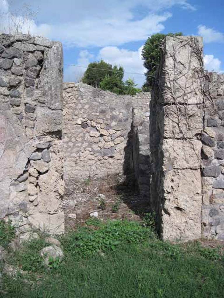I.2.17 Pompeii. September 2010. Looking east into doorway of room 4.
Photo courtesy of Drew Baker.