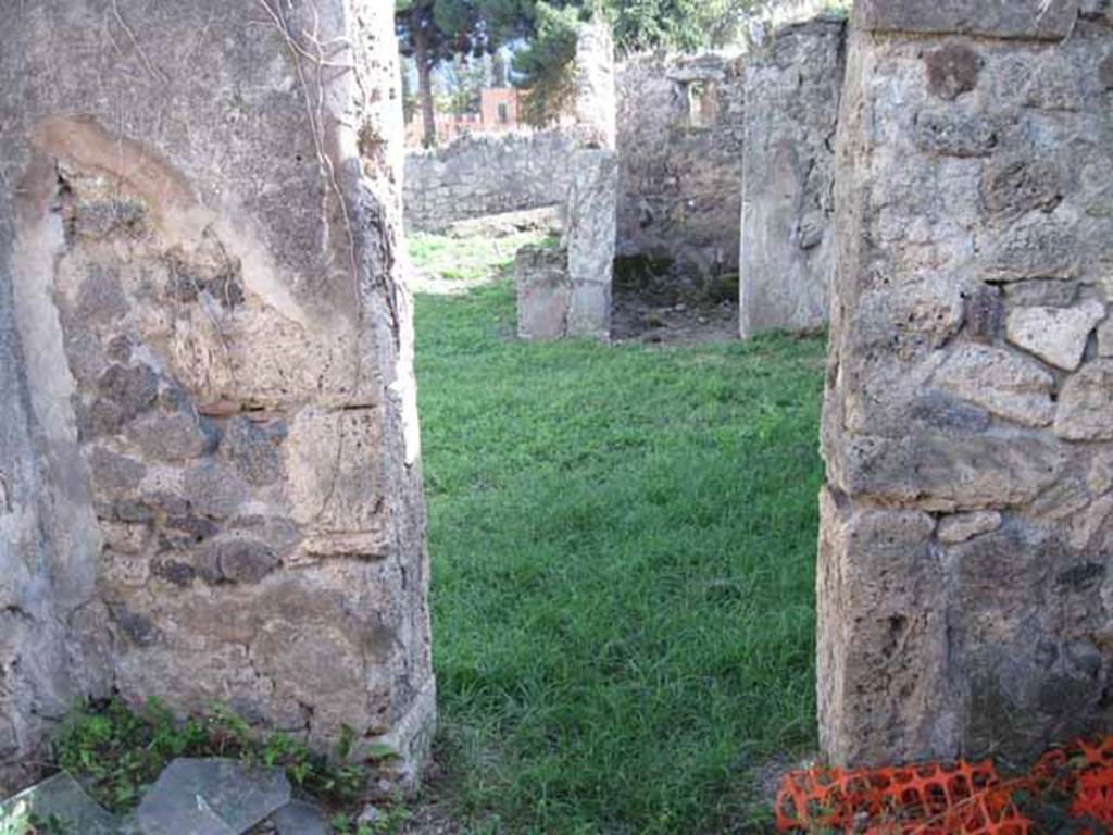 I.2.17 Pompeii. September 2010. Looking south from doorway of room 5, into atrium, and across to doorway of room 6. Photo courtesy of Drew Baker.