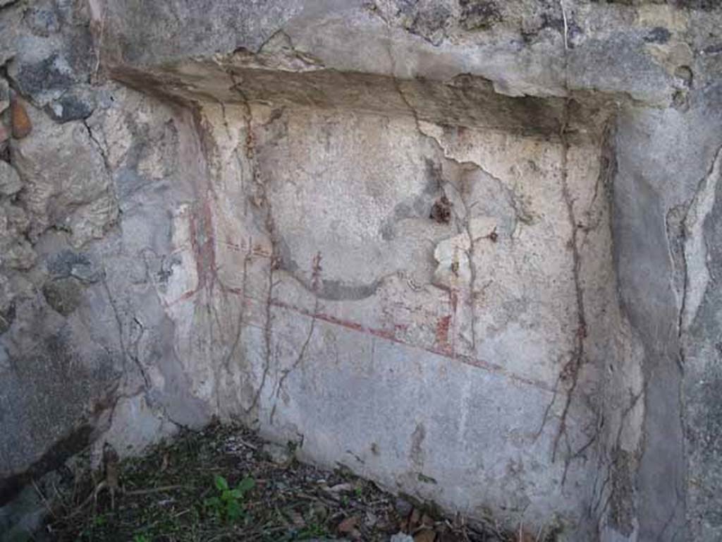I.2.17 Pompeii. September 2010. Room 6, south-west corner with detail of bed recess or niche. Photo courtesy of Drew Baker.