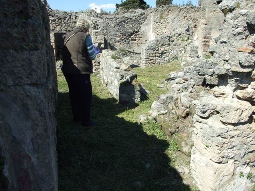I.2.17 Pompeii. March 2009. Looking north from Triclinium, to corridor on south east side of Atrium. Also doorway to Room 11.