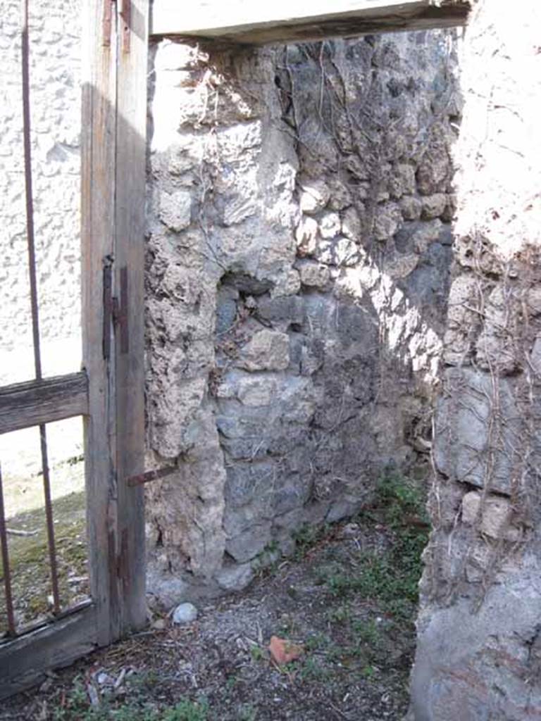 I.2.17 Pompeii. September 2010. Looking north-east. Doorway, directly east of entrance, at north end of room 2. Photo courtesy of Drew Baker.
