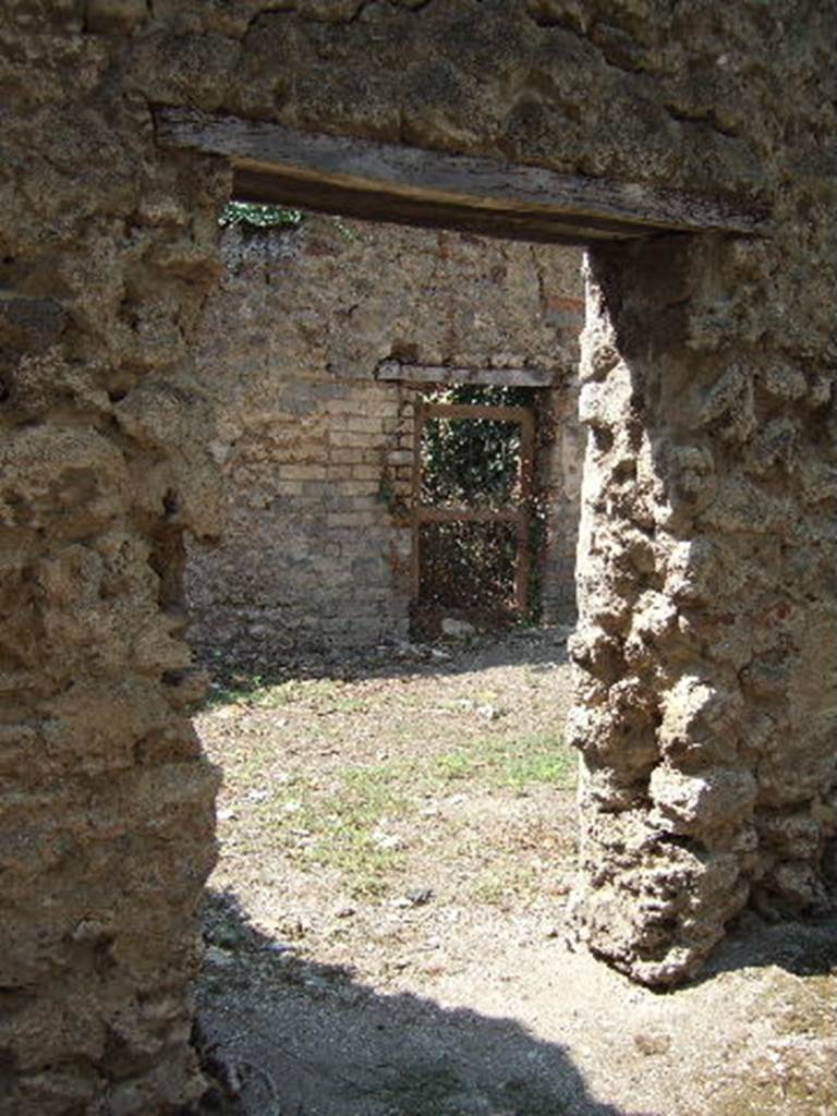 I.2.19 Pompeii. September 2005. Looking west towards door to I.2.17
