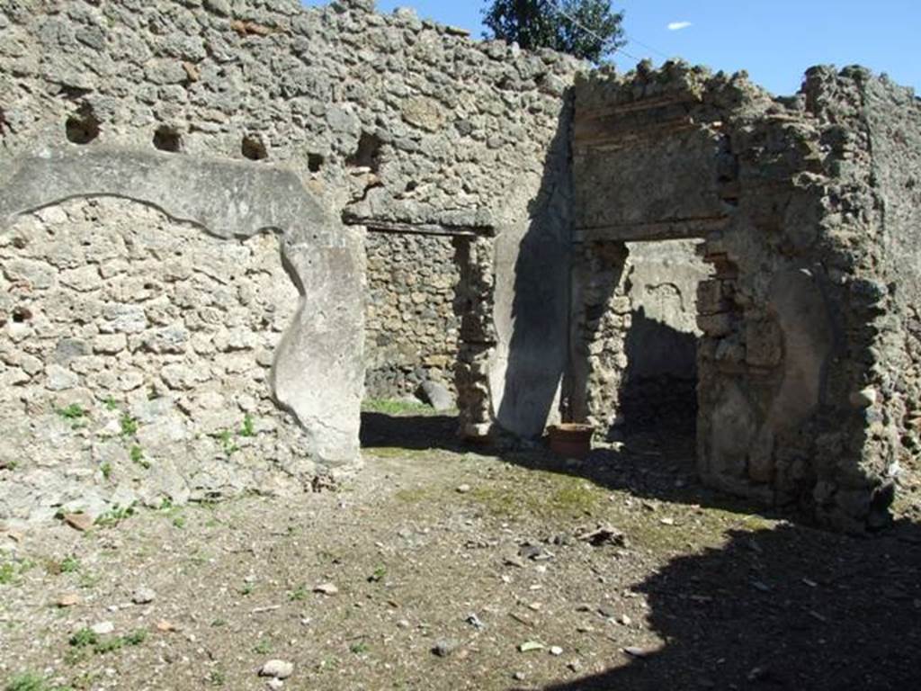 I.2.19 Pompeii. March 2009. Rear entrance doorway, and room on south side of doorway. Taken from doorway from I.2.17. Looking south-east.