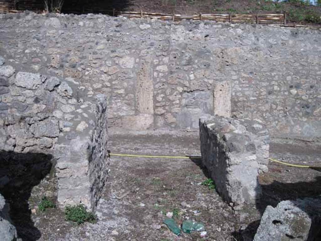 I.2.20 Pompeii. September 2010. Entrance doorway, looking east. Looking towards entrance doorway, and out onto Vicolo del Citarista. Photo courtesy of Drew Baker.