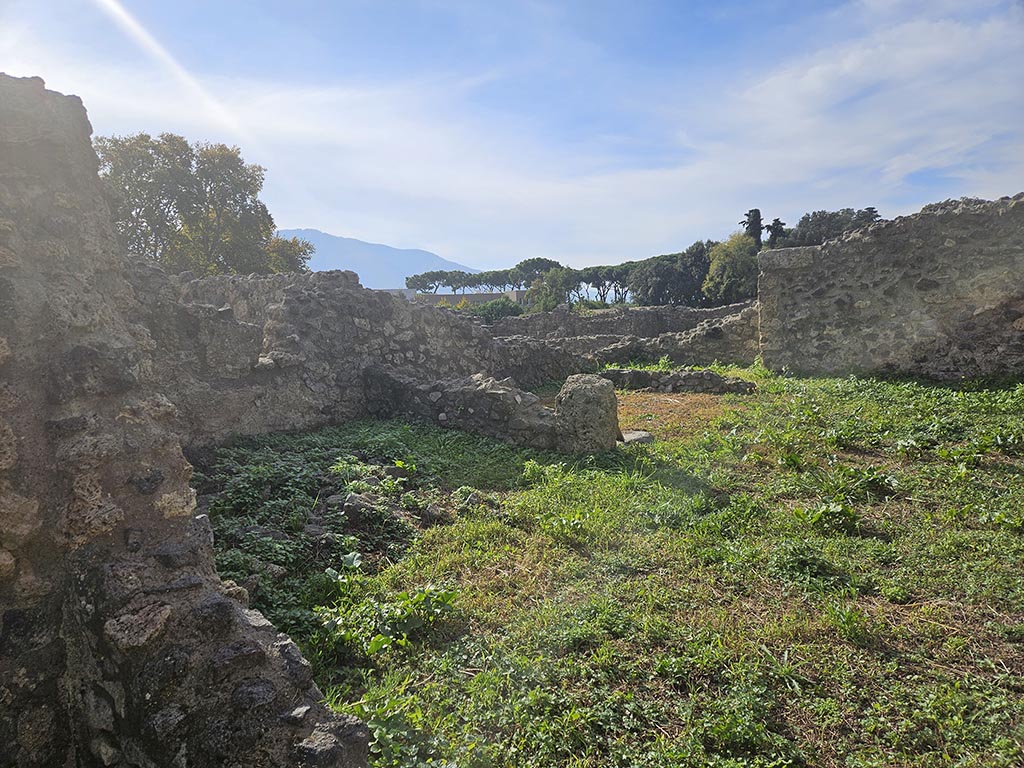 I.2.20 Pompeii. November 2024.
Looking south-west from small atrium towards rooms on south side of garden area. Photo courtesy of Annette Haug.