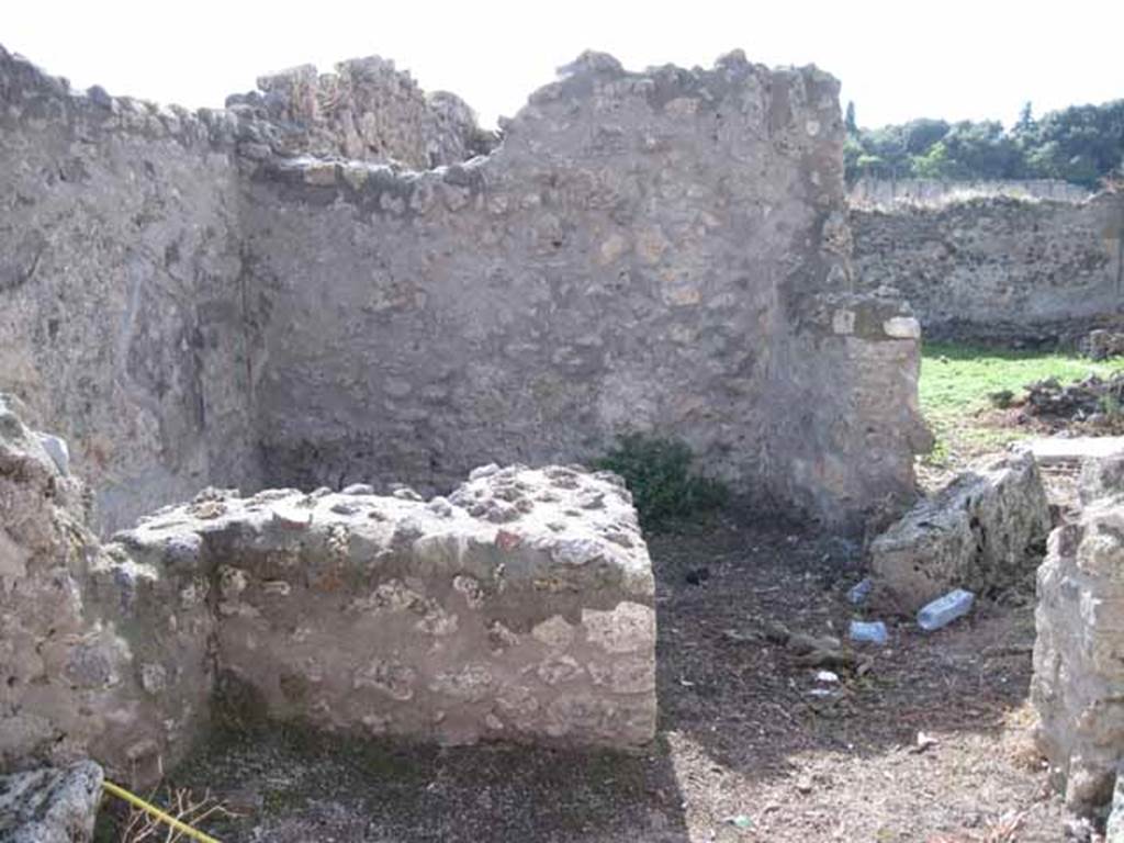 I.2.21 Pompeii. September 2010. Looking west towards entrance doorway across vicolo.
Photo courtesy of Drew Baker. According to Warscher, quoting Fiorelli, she described –
“Il thermopolium no.21 aveva una sola taberna, col banco rivestito di marmi, ed un separato focolare, a destra della porta”. (translation: “The thermopolium no.21, had only one room, with bench faced with marble, and a separate hearth, to the right of the door”.)
See Fiorelli, Descrizione, p.45/46.
See Pappalardo, U., 2001. La Descrizione di Pompei per Giuseppe Fiorelli (1875). Napoli: Massa Editore, (p.36).
See Warscher T., 1935. Codex Topographicus Pompeianus: Regio I.2. Rome: DAIR, whose copyright it remains.