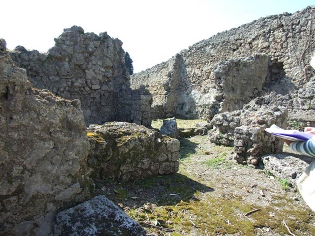 I.2.21 Pompeii. March 2009. Looking north west through entrance into Thermopolium, with I.2.20 at the rear.