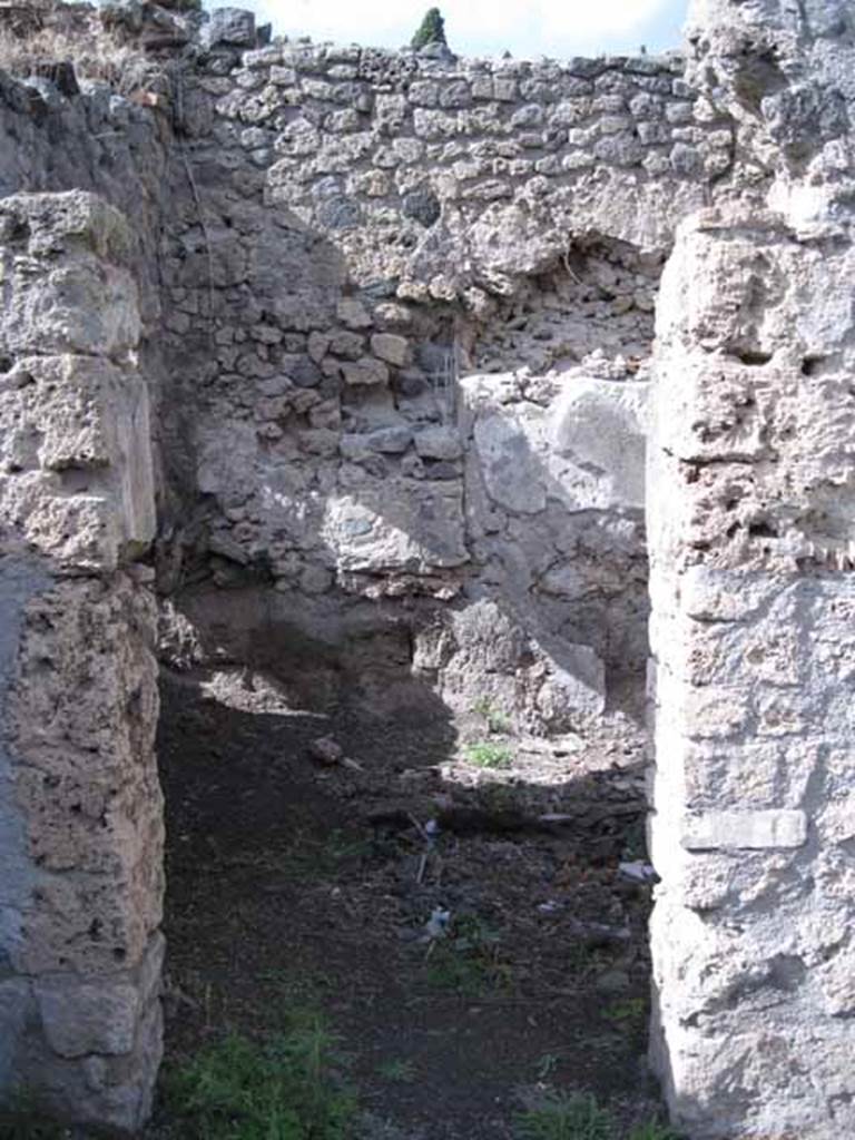 I.2.22 Pompeii. September 2010. Doorway to room 4, triclinium, in north wall of shop. Photo courtesy of Drew Baker. This is the room that Warscher described as a �cubiculum�.
