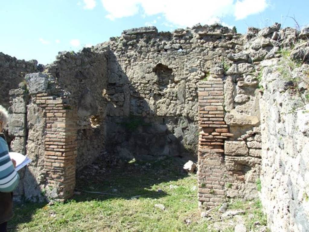 I.2.22 Pompeii.  March 2009.  Room 6, in north east corner of open garden area.
According to Warscher, the north wall seemed to have been very old. �Il muro nord sembra essere molto antico, giacche si vedono i gruppi delle pietre di lava, come per esempio nella stanza �f� (our room 6). Le pareti che separano le stanze �f� e �g� (rooms 6 and 7) dalla grande stanza �e� (room 5) sono di tufo. Nell�epoca tarda queste pareti sono state ingrandite con mattoni�.  (see picture 40 below).
See Warscher T., 1935. Codex Topographicus Pompeianus: Regio I.2. Rome: DAIR, whose copyright it remains.
