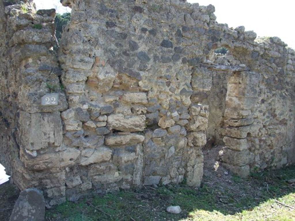 I.2.22 Pompeii. March 2009. Shop Entrance. South wall, with door to kitchen area, in Rooms 2 and 3.
