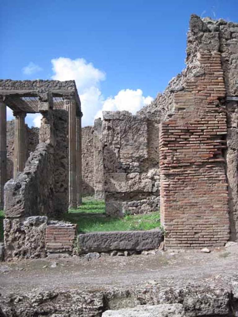 I.2.27 Pompeii. September 2010. Looking north across Vicolo del Conciapelle towards entrance doorway. Photo courtesy of Drew Baker.