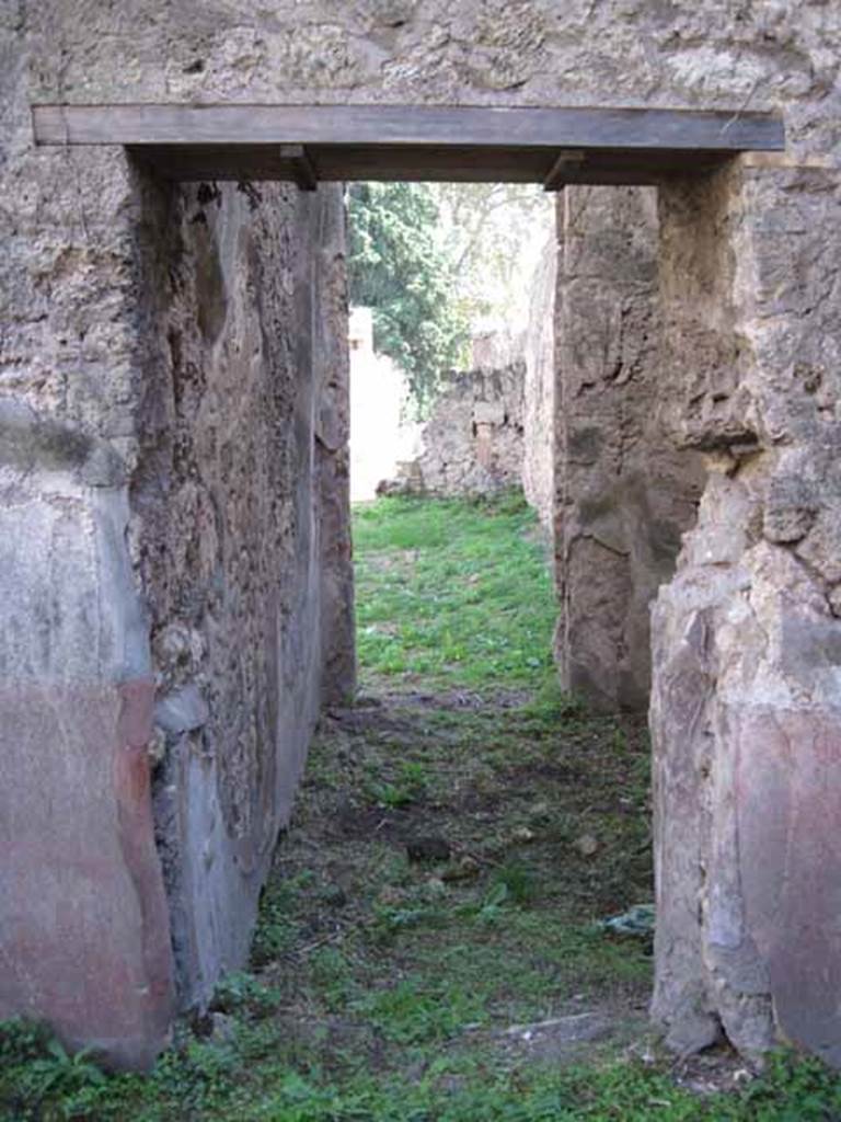 I.2.28 Pompeii. September 2010. Looking south through doorway into cubiculum and through its doorway to atrium, from room on south side of triclinium. Photo courtesy of Drew Baker.