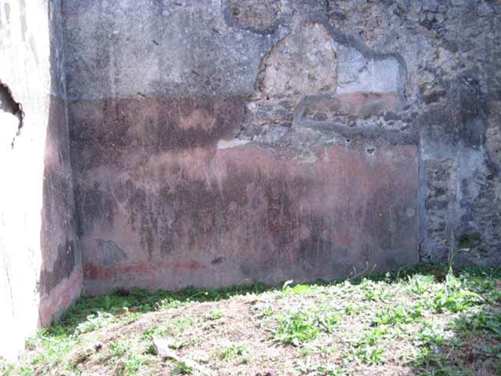 I.2.28 Pompeii. September 2010. South wall, of room on east side of corridor.
The doorway to the corridor would have been in the west wall, on the right. Photo courtesy of Drew Baker.