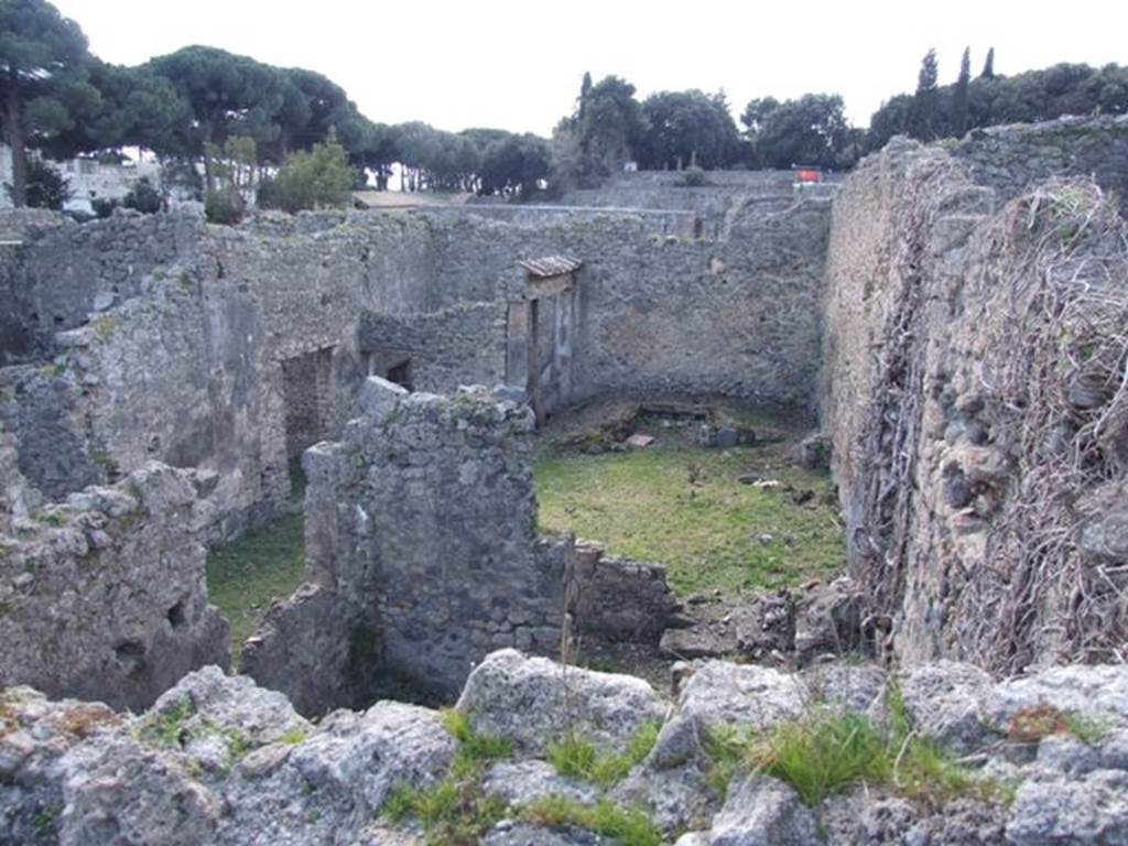 I.2.28 Pompeii. March 2009. Looking west towards Garden Triclinium. Taken from I.2.20.