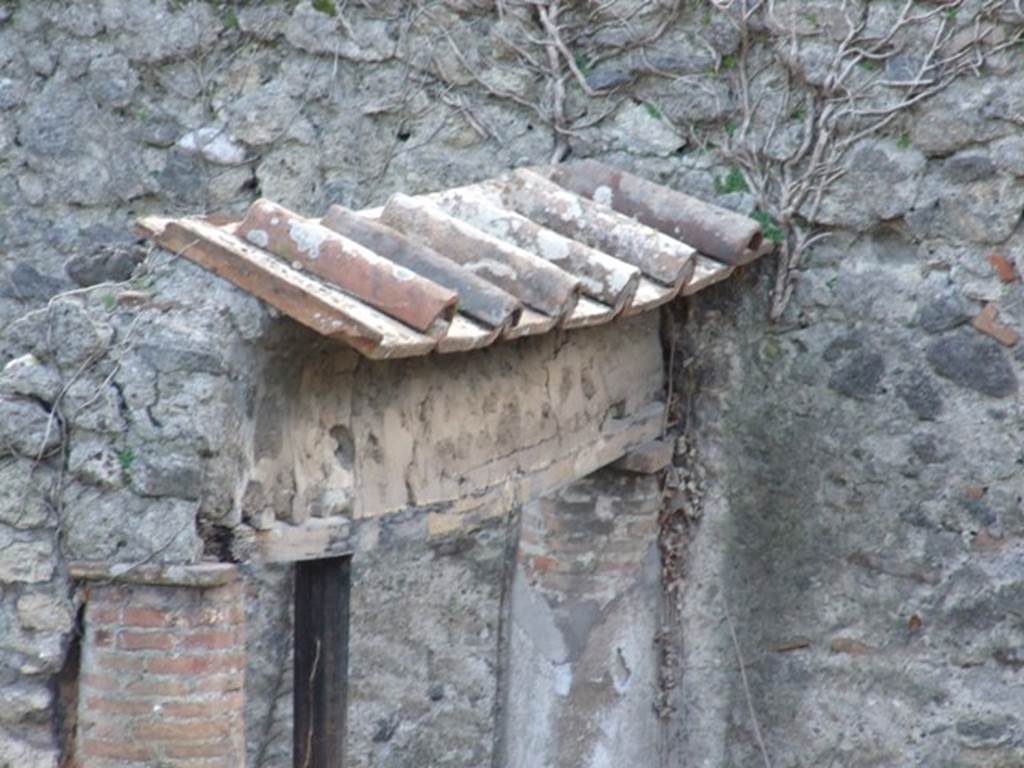 I.2.28 Pompeii. March 2009. Looking west towards wall on south side of Garden Triclinium.Taken from I.2.20.
