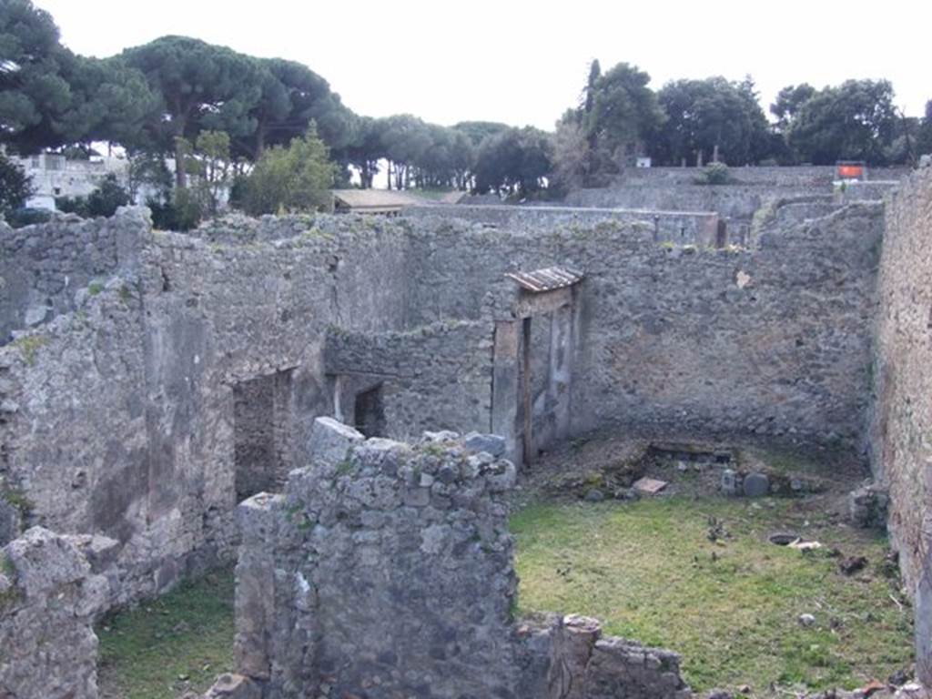I.2.28 Pompeii. March 2009. Looking west towards Garden Triclinium, and room with window overlooking it. Taken from I.2.20.