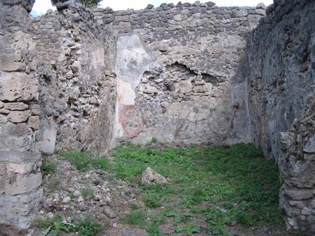 I.2.28 Pompeii. September 2010. Looking east into large triclinium on east side of portico. Photo courtesy of Drew Baker. According to Fiorelli, this room was adorned with paintings, of which two were saved. One of a big country scene with pastoral sacrarium and goats. The other showing Cassandra and Hector predicting the ruin of Troy to Priam, caused by the young boy Paris. Paris is leaning against the King’s knee holding an apple. See Pappalardo, U., 2001. La Descrizione di Pompei per Giuseppe Fiorelli (1875). Napoli: Massa Editore. (p.37 and black and white drawing)
According to Sogliano, paintings found in the triclinium were –
Amore and Psiche at the hunt, on a black background, and Eros at the hunt, on a black background (p. 64, nos. 374 and 375).
Prophecy of Cassandra. Now in Naples Archaeological Museum: 111476.This was found damaged at the upper corner (p.105, no.560).
Landscape: the scene represented a valley between high mountains (p.141, no.684)
See Sogliano, A., 1879. Le pitture murali campane scoverte negli anni 1867-79. Napoli: (pages, as above)