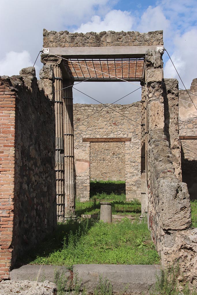 I.2.28 Pompeii. October 2024.
Looking north from entrance along fauces towards atrium. Photo courtesy of Klaus Heese.
