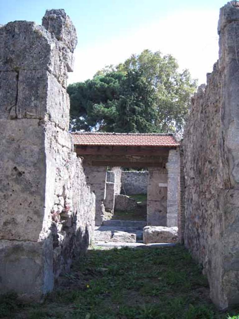 I.2.28 Pompeii. September 2010. Looking south from atrium, along entrance fauces to doorway on Vicolo del Conciapelle. Photo courtesy of Drew Baker.
