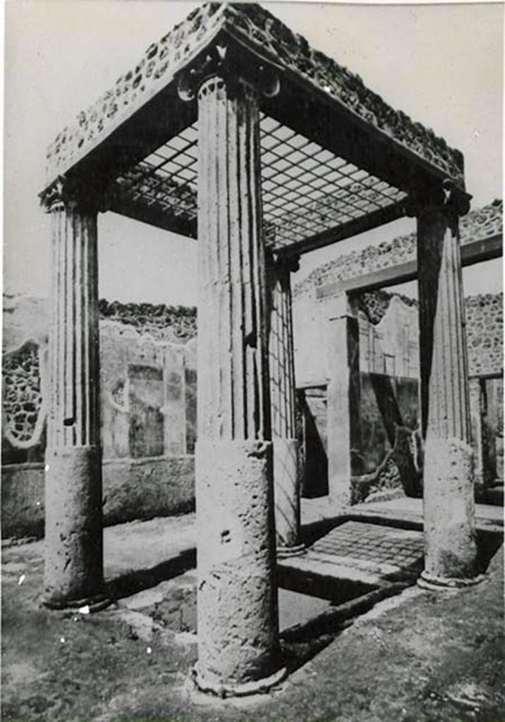 I.2.28 Pompeii. Tatiana Warscher described this as a “Riproduzione di un vecchia fotografia – Si vedono le traccie della decorazione murale del IV stile”.  (translation: “Reproduction of an old photograph – one can see the traces of the IVth style wall decorations).
Looking towards the north-west corner of the atrium.
See Warscher T., 1935. Codex Topographicus Pompeianus: Regio I.2. (no.49), Rome: DAIR, whose copyright it remains.

