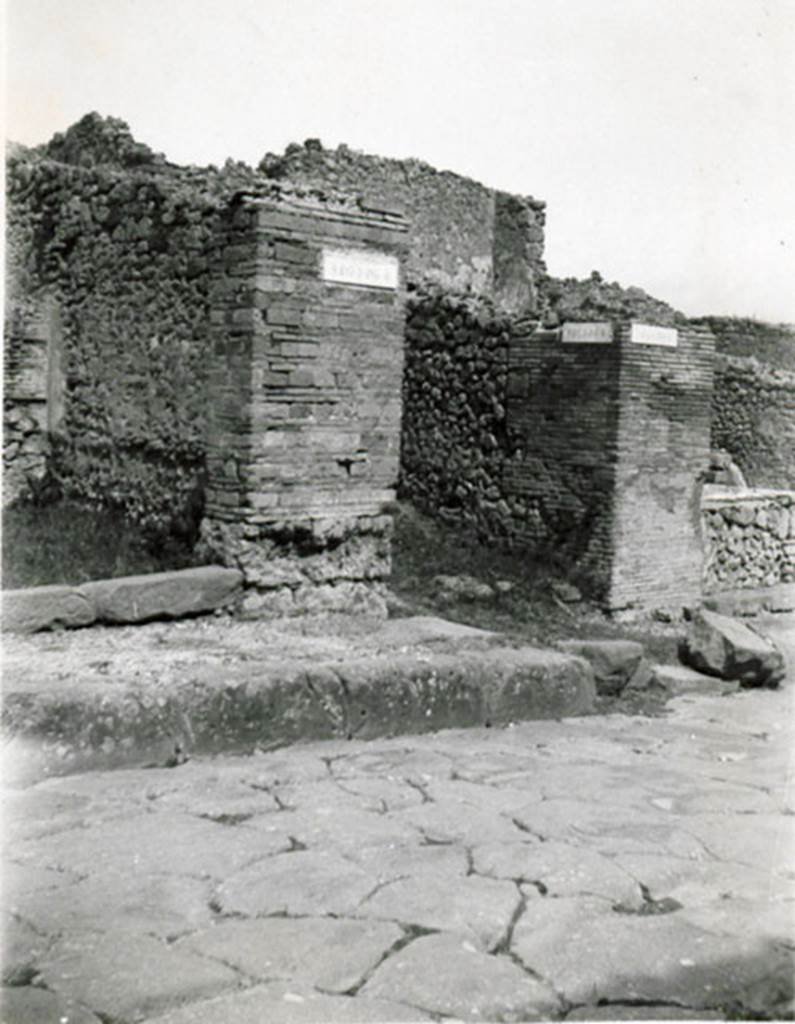 I.3.1 Pompeii. 1935 photograph taken by Tatiana Warscher. Looking south-east towards south side of entrance doorway on Via Stabiana, and roadway (Via Secunda).
See Warscher T., 1935. Codex Topographicus Pompeianus: Regio I.3. (no.80), Rome: DAIR, whose copyright it remains.