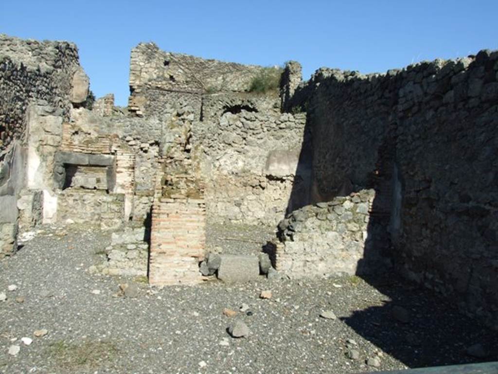I.3.1 Pompeii. March 2009. South side of bakery shop, with remains of small room in south east corner.
